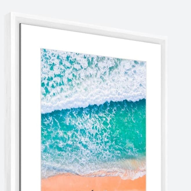 Netgear Meural Canvas II 27 in. smart art frame with white 19x29 frame