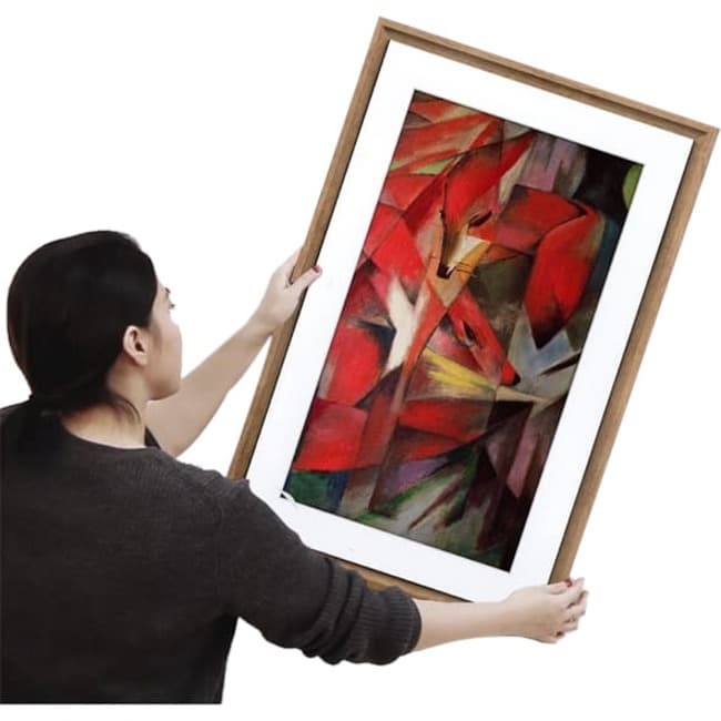 Meural Canvas II smart art frame with 27 inch display and 19 x 29 walnut Winslow frame