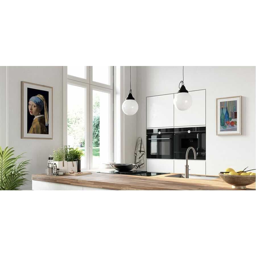 Meural Canvas II smart art frame with 27 inch display and 19 x 29 walnut Winslow frame