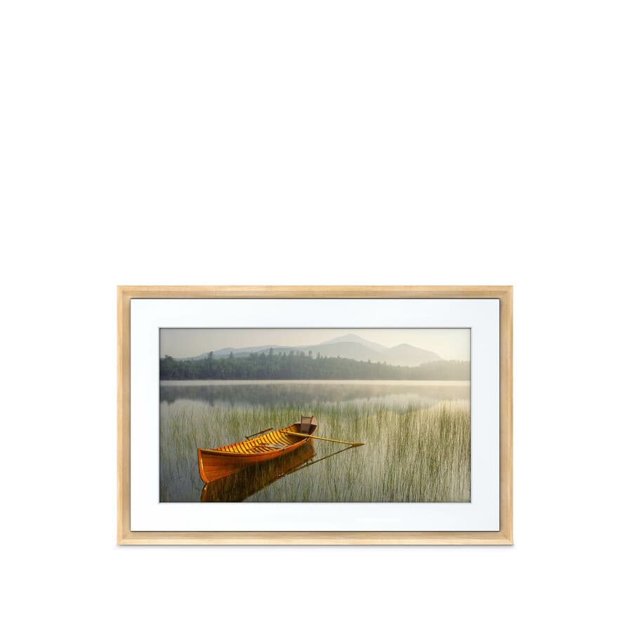 Netgear Meural Canvas II 27 in. smart art frame with walnut Winslow frame